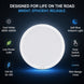 Round light fixture with features listed on a dark background