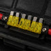 Set of yellow fuses in a black fuse holder