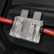Electrical connector with red and black wires on a black background