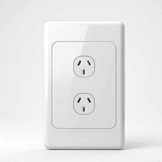 White wall socket on a light gray background