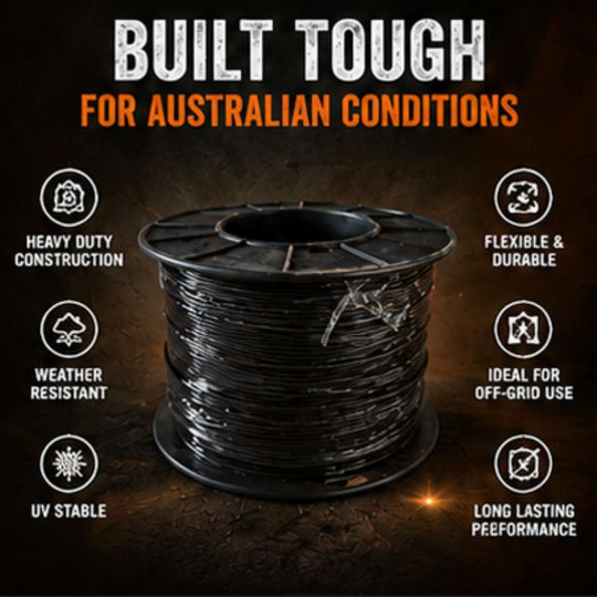 Spool of black cable with features highlighted on a dark background