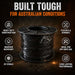 Spool of black cable with features highlighted on a dark background