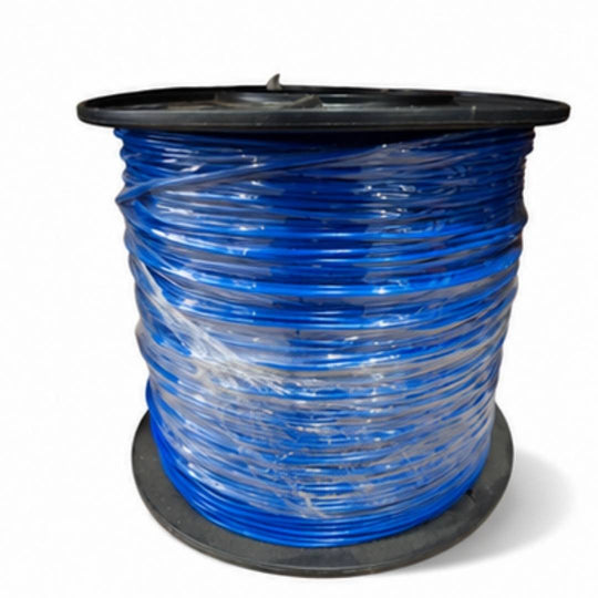 Spool of blue cable on a white background