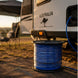 Spool of blue cable in front of a caravan with 'Australia' and a kangaroo logo.