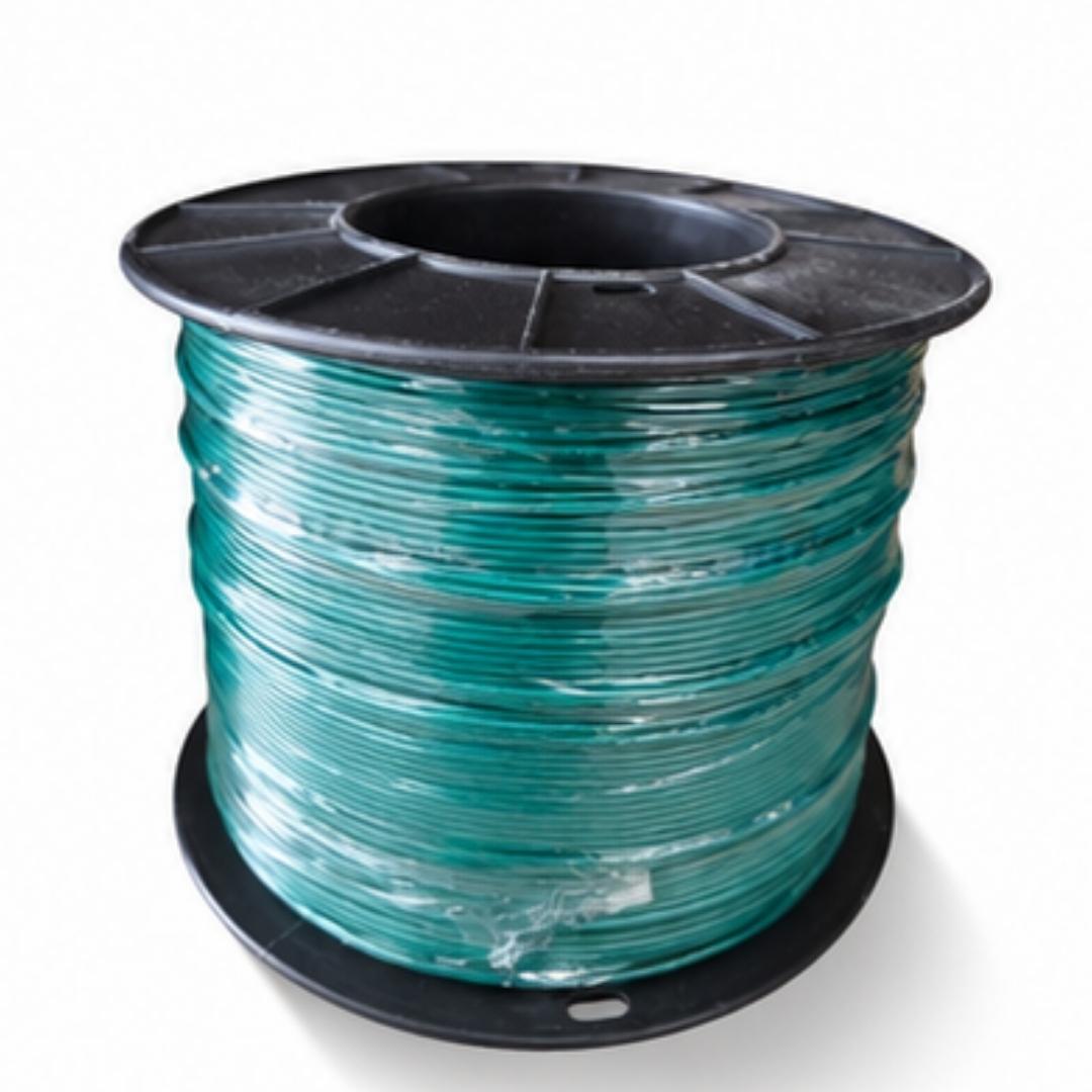 Spool of green cable on a white background