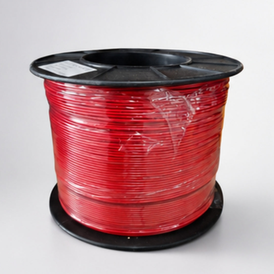 Close-up of a spool of white cable with visible copper wires, branded 'BROOKS'.