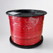 Close-up of a spool of white cable with visible copper wires, branded 'BROOKS'.