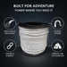 Spool of cable with features highlighted on a dark background