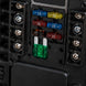 Car fuse box with various colored fuses