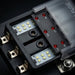 Fuse box with visible fuses and indicators on a dark background