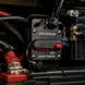Waterproof electrical switch with ignition protected feature in a dark engine compartment.