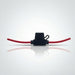 Black electrical connector with red wire on a white background