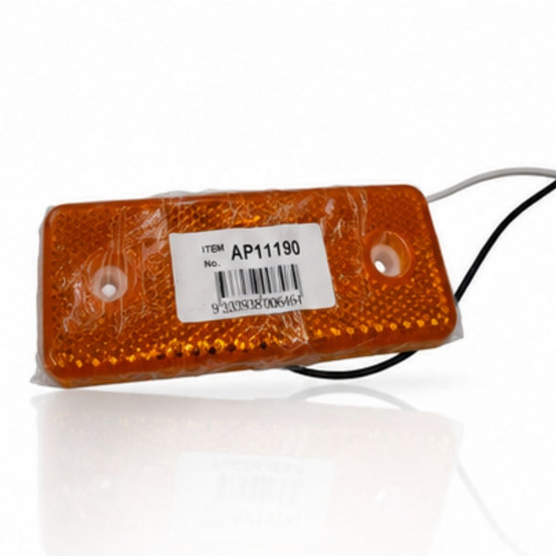 Orange rectangular light with a label on a white background