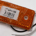 Orange LED light with a barcode label on a white background