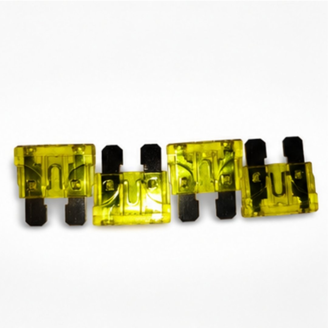 Set of yellow fuses on a white background