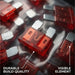 Close-up of red fuses with labels highlighting 'Durable Build Quality' and 'Visible Element'.