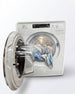 Silver washing machine with open door showing clothes inside on a white background