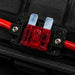 Fuse holder with fuses and wires on a black background