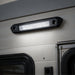 LED light bar mounted on a vehicle's exterior panel.