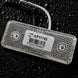 Rectangular electronic component with a label on a dark textured background