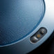 Close-up of a blue textured surface with control buttons