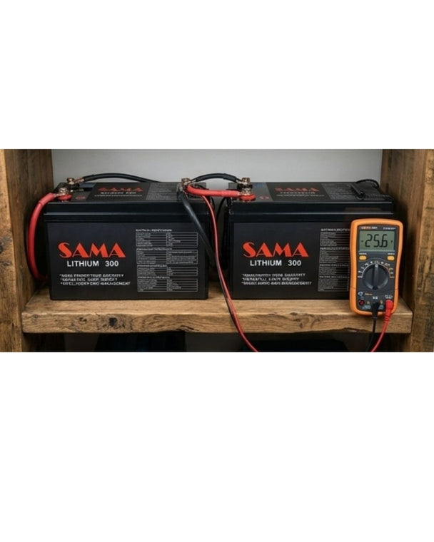 Two SAMA lithium batteries on a wooden shelf with a multimeter displaying voltage.
