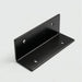 Black metal bracket on a light gray background