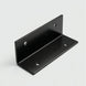 Black metal bracket on a light gray background
