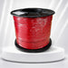 Spool of red wire on a white background