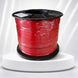 Spool of red wire on a white background