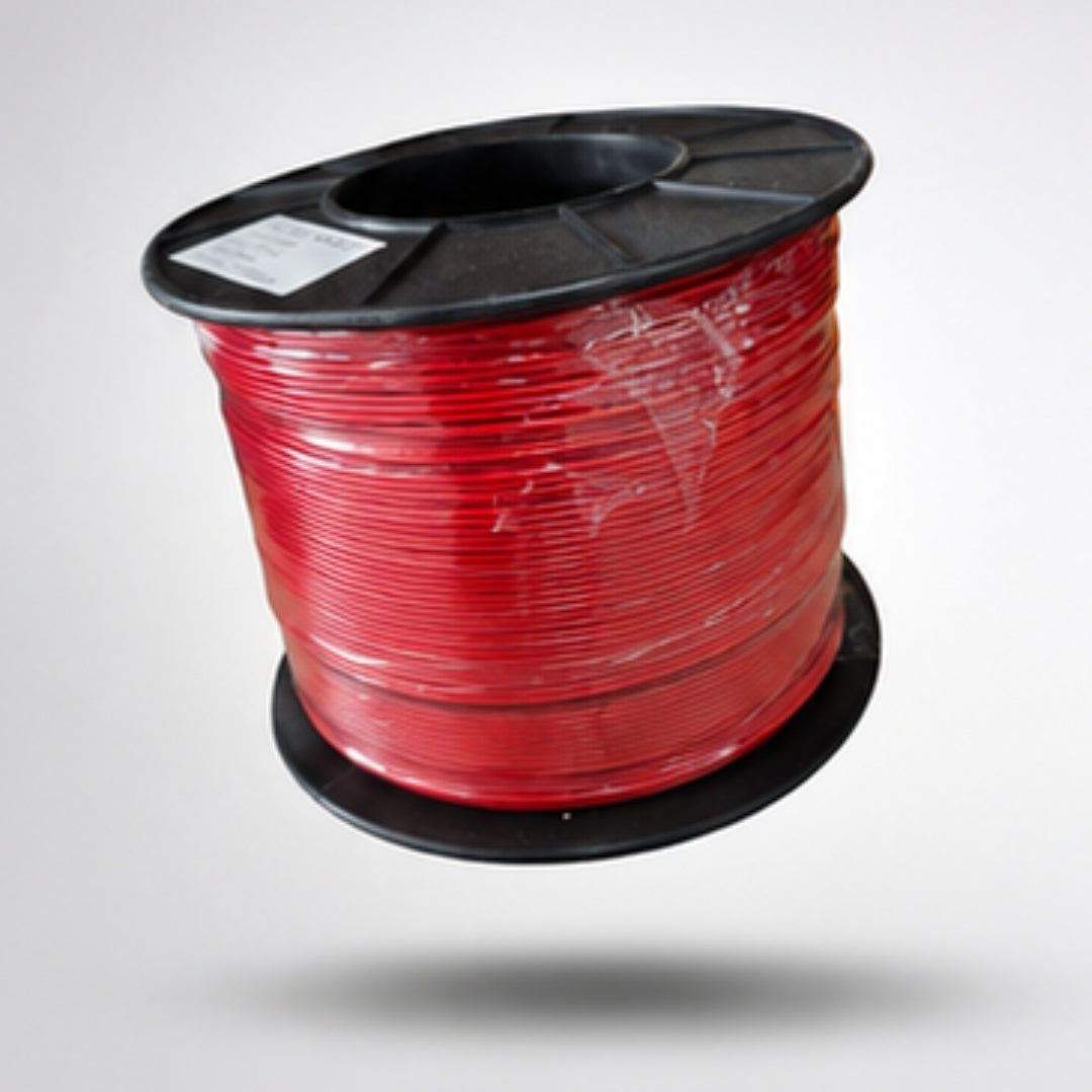 Spool of red wire on a white background