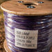 Spool of purple wire with a label on a wooden reel