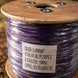 Spool of purple wire with a label on a wooden reel